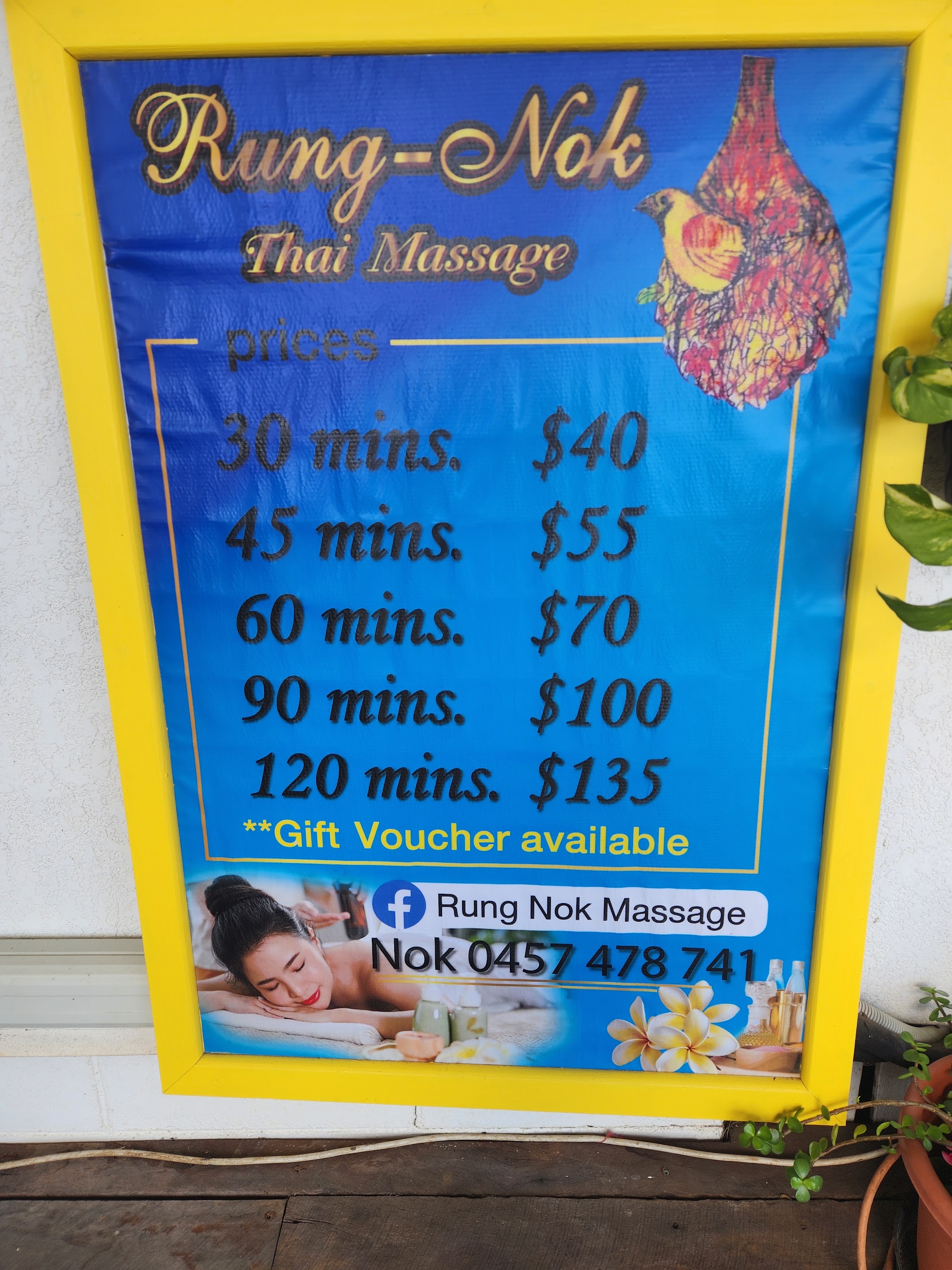 The Rung Nok Thai Massage price board showing times and prices